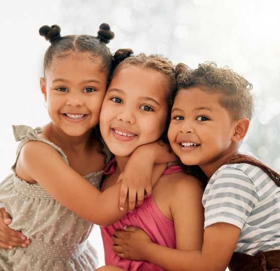 Children smiling after a positive dental visit