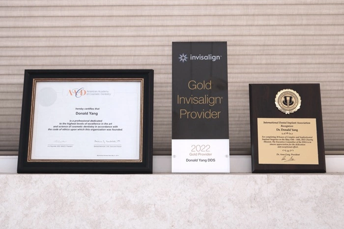 Awards and recognitions displayed at Broadway Dental of Millbrae