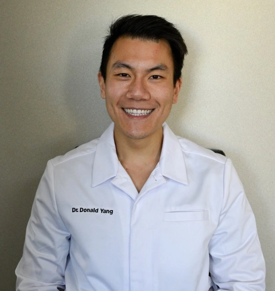 Dr. Donald Yang smiling in a professional portrait