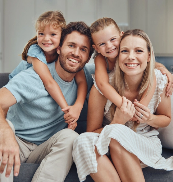 Happy family with two young children